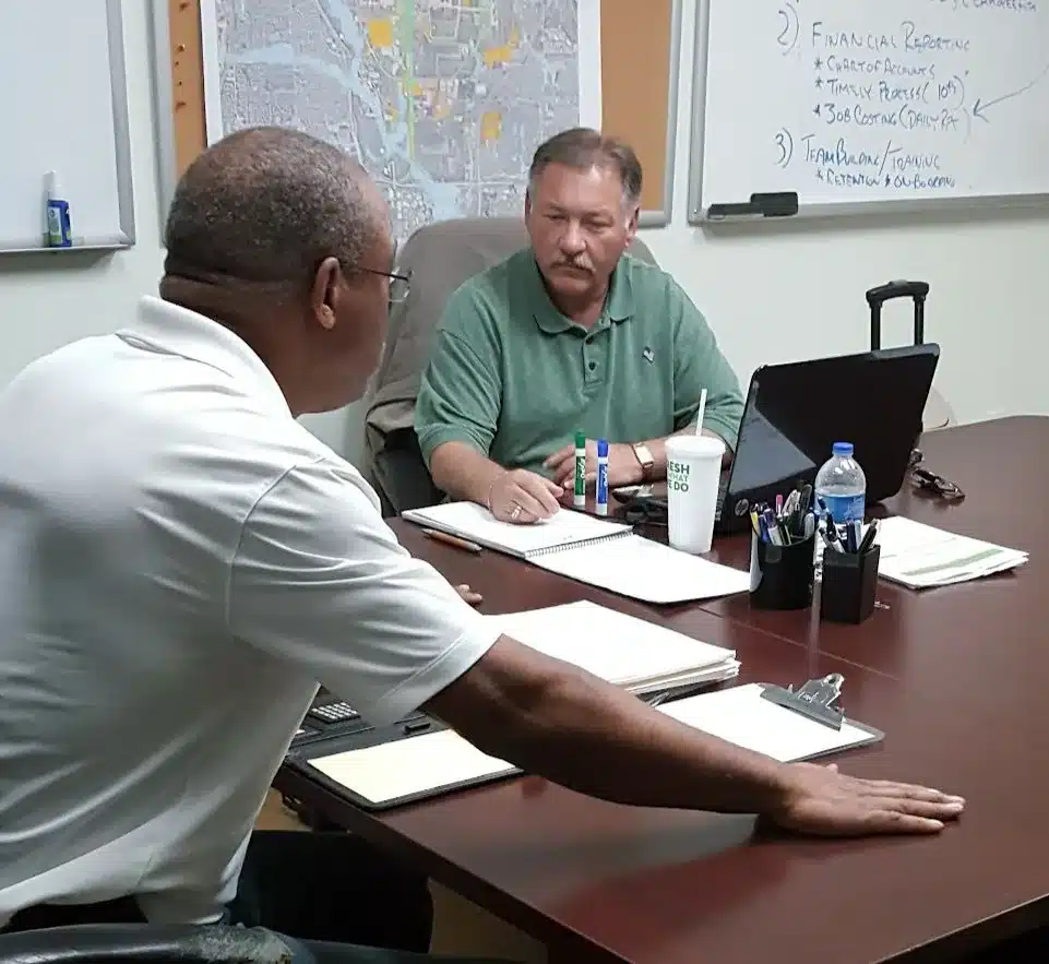 Fred Haskett in a one-on-one working session with a business owner